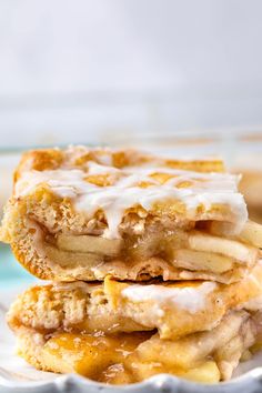 two pieces of apple pie stacked on top of each other