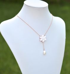 "2018 Collection, MORNING HEIRLOOM Y NECKLACE COLLECTION Featuring hand sculpted white Gardenia and tear drop pearl necklace. Details : - Gardenia made from baking polymer clay. -Flower size approx : 22-23mm - Flower glued on metal plated over brass filigree. - Entire length ; 16 inches + 2 \" extender. Finish with lobster clasp. - Chain finish available in silver plated, antiqued brass, gold and rose gold. - Sterling silver and gold filled chain available with additional cost, ( the filigree in Elegant White Flower Necklace With Adjustable Chain, White Flower Shaped Necklace With Adjustable Chain, Rose Gold Flower Jewelry With Pearl Drop, Rose Gold Flower-shaped Jewelry With Pearl Drop, White Teardrop Pendant Jewelry With Pearl Chain, White Pendant Necklace With Flower Charm, Pearl Chain Jewelry With Flower Pendant, White Flower Pendant Jewelry With Adjustable Chain, Pearl White Flower Shaped Jewelry With Pearl Drop