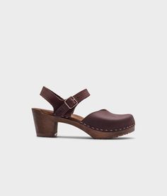 high heeled closed-toe clog sandal in dark brown nubuck leather stapled on a dark wooden base Sandgrens Clogs, Cork Sandals, Clog Sandals, Wooden Clogs, Boot Shop, Best Sellers, Clogs, The Struts, Timeless Design