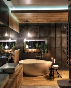 a bathroom with a large tub and sink