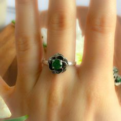 Flower Ring set with a Created Emerald in a diamond cut and flawless clarity & color (0.6 Carats). This vintage flower design is made of Solid 925 Sterling Silver (no “coating" ☞ only Solid Pure Silver - made to last) ⌛Last 2 Rings left ⌛ ☞ Choose your size ☞ I resize (before shipping) for FREE to Any size* Matching Set Available - Matching Earrings - please ask me. Details : ♥ Each item packaged in a cute GIFT BOX ✓ ♥ GUARANTEE on the materials ✓ ♥ Created Emerald in a perfect diamond cut & fla Ring Green Stone, Flawless Diamond, Green Ring, Green Rings, Antique Ring, Ring Emerald, Ring Antique, Vintage Ring, Flower Ring