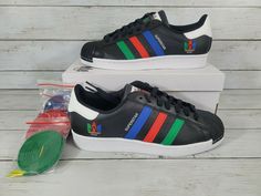 Adidas Superstar US Mens Size 8.5 FU9520 Black Green Blue Red Leather Shell Shoes. Condition is "New with box". Shipped with USPS Priority Mail. Adidas Leather Sneakers With Closed Toe, Adidas Leather Closed Toe Sneakers, Multicolor Leather Sneakers, Multicolor Leather Closed Toe Sneakers, Craig Green, Swag Shoes, Best Sneakers, Adidas Superstar Sneaker, Green Man