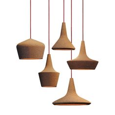 three hanging lights made out of clay