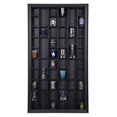 a black shelf with many glasses on it