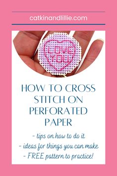 a hand holding a cross stitched badge with the words how to cross stitch on it