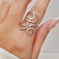 Description: Handcrafted In 92.5 Sterling Silver With A Unique Swirl Pattern And Polish Top Finish Giving A Unique Appearance. A Fabulous Statement Ring To Wear Daily To Elevate Your Look To Any Occasion. Light, Thin Wrap Style Material: Metal: 925 Sterling Silver Finish: High Polish Ring Measurements: Top Length: 27 Mm Width: 19.4 Mm Band Width: 3.6 Mm 925 Stamped Lightly Adjustable Weight: 4 Grams K E E P I N T O U Ch Https://Instagram.Com/Emmaverajewelry Https://Www.Facebook.Com/Emmaveradesig Swirl Ring, Bohemian Colors, Wrap Ring, Bohemian Rings, Handmade Rings, Boho Ring, Swirl Pattern, Wrap Rings, Elevate Your Look