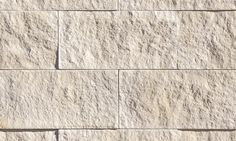 a close up view of a stone wall with no mortars or mortars on it