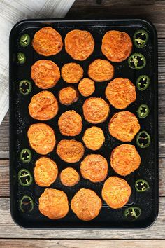 some food that is sitting on a pan and ready to be cooked in the oven