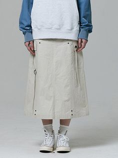 This is a casual and comfortable skirt that is made out of high quality cotton and nylon blend fabric. With design detail of vintage washed fabric, vent on the back, and D-ring detail, it gives a trendy and casual mood.- Side cargo pockets- Unique structure with rivets and eyelets- Vintage washed fabric- Back opening Utility Style Beige Cargo Skirt For Spring, Spring Utility Beige Cargo Skirt, Utility Beige Cargo Skirt For Spring, Beige Utility Cargo Skirt For Spring, Beige Utility Skirt For Spring, Comfortable Skirts, D Ring, Rivets, Long Skirt