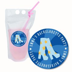 a pink drink in a plastic bag next to a sticker with the letter a on it