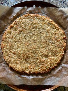 a pie sitting on top of a piece of wax paper