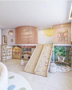 a child's play area with slides and toys