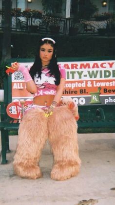 a woman sitting on top of a large furry dog