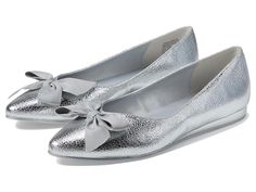 Kenneth Cole Reaction Lily Bow - Women's Shoes : Silver Metallic : Complete your look for the parties by wearing Kenneth Cole Reaction Lily Bow footwear. This slip-on flat features a pointy toe with bow detail. It is made of man-made upper, lining, and insole. The metallic finish and bow detail at the front make this footwear a perfect piece to pair with satin midis or gowns. Rubber upper. Imported. Measurements: Heel Height: 1 8 in Weight: 6.36 oz Product measurements were taken using size 7, width M. Please note that measurements may vary by size. Bow Women, Shoes Silver, Silver Shoes, Kenneth Cole Reaction, Bow Detail, Kenneth Cole, Product Reviews, Women's Shoes, Metallic Silver