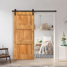 an open wooden door in a white room