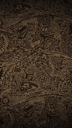 an image of a brown and black wallpaper with many different designs on the surface