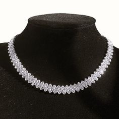 Brand New Women's Diamond Choker Necklace Details: Length - Adjustable From 12.5" To 18" Width 9mm 18k White Gold Plated Sterling Silver Genuine 4ct Lab Created Diamonds Retail Price $350 Buy With Confidence From A Trusted Seller W/ A 99%+ Feedback Rating! A0286 (Id-473) Dazzling Bridal Necklace With Prong Setting Crystals, Classic Bridal Necklace With Sparkling Stones For Anniversary, White Vvs Clarity Jewelry For Party, Diamond-shaped Diamond Necklace For Wedding, Elegant Silver Diamond-shaped Diamond Necklace, Elegant Silver Diamond-shaped Necklace, Crystal Diamond Necklace For Anniversary, Formal Bridal Necklace With Vvs Clarity, Round Shape, Formal Bridal Necklace In White Gold With Vvs Clarity