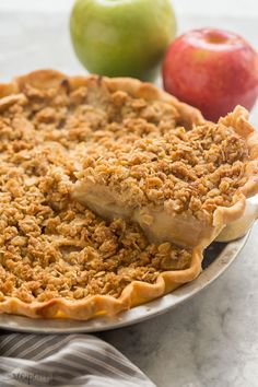 an apple pie with a slice missing from it