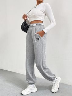 F00215614-103 Baggy Solid Color Sports Pants, Stretch Sportswear Pants For Streetwear, Casual Wide Leg Bottoms With Letter Print, Casual High Waist Pants With Letter Print, Casual Straight Leg Bottoms With Letter Print, Sporty Wide Leg Sweatpants With Letter Print, Sporty Wide Leg Bottoms With Letter Print, Baggy Wide-leg Sports Pants, Casual Full Length Sweatpants With Letter Print