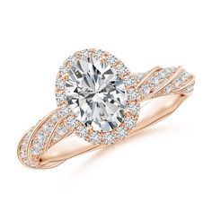 a rose gold engagement ring with an oval center surrounded by round brilliant cut diamond accents