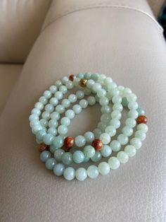 🌈 Jadeite Beaded (7.5mm) Necklace Bracelet, Green Brown Light Lavender, 108 beads 🌷 Untreated Natural Jadeite (Grade A Jade) 🌷 Jade from Myanmar/ Burma 🌷 100% handmade carving 🌷 Bead size : 7.5 MM 🌷 Number of Beads : 108 🌷 Color : Green, Brown & Light Lavender 🌷 Free shipping from Hong Kong with tracking number provided 🌷 Take approximately 7-28 days to arrive worldwide ❤️ In Chinese Culture: Young people wear jade pendant will have a prosperous life, attracts good luck and friendsh Aventurine 8mm Beads Bracelet For Meditation, Meditation Aventurine 8mm Beads Bracelet, Green Amazonite Jewelry With 8mm Beads, Jade Gemstone Beaded Bracelets For Meditation, Natural Stone Beads For Meditation, Amazonite Necklace With 108 Round Beads, Amazonite Beaded Bracelets For Meditation, Meditation Beaded Bracelets With Amazonite, Natural Stones Meditation Beads