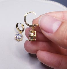 About 2 cm in length. Solid 14k gold posts. Especially good for people with metal allergies. Minimalist Gold Jewelry With Bail, Gold Cubic Zirconia Round Clip-on Earrings, Gold-plated Jewelry With Prong Setting, Classic Dangle Huggie Earrings With Cubic Zirconia, Elegant Small Hoop Jewelry With Bail, Classic Dangle Cubic Zirconia Huggie Earrings, Gold Cubic Zirconia Hoop Earrings Gift, 14k Gold Dangle Huggie Earrings, Gold Cubic Zirconia Tarnish-resistant Earrings