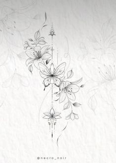 a black and white drawing of flowers on paper