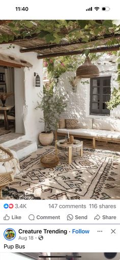 an image of a patio with furniture and plants