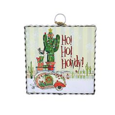 The Scene Has A Small Vintage Travel Trailer Decorated For The Holidays With The Tailgate Opened With A Red Lantern Hanging. Behind The Trailer Is A Large Christmas Decorated Cactus In A Red Glittered Pot With Gigs By It. Small Cactus Complete The Scene. "Ho! Ho! Howdy" Is Written On The Plaque.. 7 In H X 6 In W X 1 In D. Purchase includes One Plaque. Southwest Christmas Decor, Wood Cactus, Round Top Collection, Lantern Hanging, Trailer Decor, Desert Southwest, Small Cactus, Vintage Travel Trailers, Red Lantern