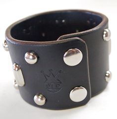 "This Beautiful black leather cuff is made using American bridle leather. I hand style the edges in a slightly distressed yet slick fashion and stud the top accordingly. Can be made in Beautiful brown Bridle leather as well! Custom sized for your wrist! Please use the instructions in the pics above! - 2- 1/8\" wide - Studded - American bridle leather Thanks! Freddie" Las Vegas Style, Hand Style, Fear And Loathing, Vegas Style, Leather Cuffs, Wrap Bracelet, Leather Bracelet, Cuff Bracelets, North America