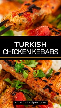 chicken kebabs with tomatoes, onions and parsley on the side are shown