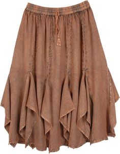 Stonewashed coppered colored western skirt with embroidery with gores at the hem. This rayon skirt has a great fall with an elastic waist and its free-flowing around hips for a comfortable fit. The embroidery is on the front as well as the back. The skirt is a distinct reminder of the old-time western skirts with a hint of the Renaissance. Ideal to wear at work or out in the evening, dress up or down with accessories. The skirt can be worn with a camisole or corset top and goes well with boots. Brown Ruffled Skirt Bottoms, Brown Skirted Bottoms With Ruffled Skirt, Brown Skirted Bottoms With Ruffled Detail, Brown Ruffled Skirted Bottoms, Bohemian Cotton Maxi Skirt For Fall, Brown Cotton Flowy Skirt, Brown Ruffled Flared Skirt, Flowy Cotton Brown Skirt, Brown Flowy Cotton Skirt