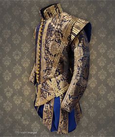 This Western European bourgeois costume for men consists of a doublet of pure silk (wams) and silk breeches (haut-de-chausses). The doublet was a stylish men's costume during the Renaissance. It was a tight jacket usually made of delicate fabrics such as silk,  velvet, or brocade, and decorated with embroidery, lace, or other decorations. It reflects the wealth and status of the person who wears it. Silk was a highly valued fabric during this period and was imported from places like Italy and Ch Royal Ceremonial Fitted Sets, Royal Fitted Ceremonial Sets, 1650s Fashion, French Men Style, Court Fashion, Elizabethan Fashion, Medieval Garb, Costume For Men, Medieval Clothes