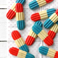 red, white and blue toothpicks are arranged in the shape of candy canes