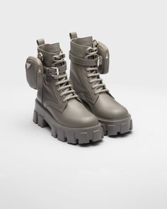 Marble Gray Monolith Leather And Re-nylon Boots With Pouch | PRADA Boots With Pouch, Shoes Room, Prada Monolith, Industrial Fabric, Prada Boots, Prada Collection, Color Celeste, Lettering Logo, Triangle Logo