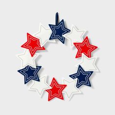 red, white and blue stars are arranged in a circle on top of each other