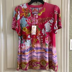 Women’s Floral Print Blouse With Flutter Sleeves By Johnny Was Brand, Size Medium. See Measurements For Specifics On Size! Self - 95% Viscose/5% Spandex And Machine Washable! Rounded Neckline Flutter Sleeves Floral Print With Tie Dye New With Tags! Pink Flutter Sleeve Casual Top, Summer Pink Flutter Sleeve Tops, Pink Fitted Top With Flutter Sleeves, Pink Flowy Blouse With Flutter Sleeves, Pink Flowy Short Sleeve Top, Fitted Multicolor Flutter Sleeve Tops, Feminine Multicolor Short Sleeve Tops, Pink Fitted Blouse With Flutter Sleeves, Bohemian Pink Tops With Flutter Sleeves