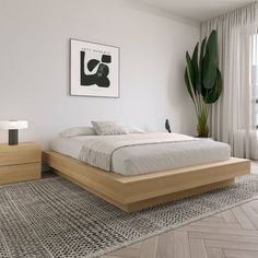 a bedroom with a bed, nightstands and plants