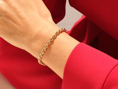 Give your personal style an extra zing with this bold, statement-making bracelet. A luxurious and timeless addition to any bracelet collection, its rich color and sleek design makes it a worthy investment. • Material: 14k Solid Gold (Stamped 14K for authenticity) • Color Options: Yellow Gold • Chain Style: Rope Chain • Chain Width: 4.50 mm • Clasp Type: lobster clasp • Available Lengths: 5", 5.5", 6", 6.5", 7", 7.5", 8" For custom lengths feel free to contact us. We can make this bracelet in any Elegant Formal Chain Bracelet With Shiny Finish, Elegant Shiny Finish Chain Bracelet For Formal Occasions, Elegant Gold Chain Bracelet For Everyday Luxury, Elegant Link Jewelry With Shiny Finish, Yellow Gold Chain Bracelet For Formal Occasions, Yellow Gold Chain, Bracelet Collection, Rope Chain, Gold Yellow