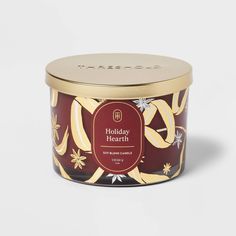 holiday hearth candle tin with gold lid