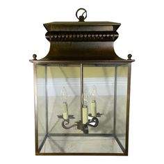 This elegant zinc lantern pendant is a stunning addition to any room in the house. Its intricate design features a square frame with a decorative top and three lights, each capable of holding a 60W bulb. The lantern is made of high-quality metal and boasts a beautiful, aged finish that adds a touch of rustic charm. It comes complete with a matching canopy and chain, making it easy to install and enjoy. This versatile lantern can be used to create a variety of looks, from traditional to modern. It would make a beautiful statement piece in a dining room, living room, or bedroom. Urban Electric, Lantern Chandelier, Chain Making, Lantern Pendant, Dining Room Living Room, Glass Pendant Light, Chandeliers And Pendants, Square Frame, Intricate Design