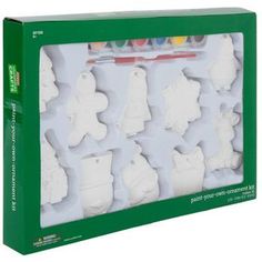 a box filled with lots of white snowmen