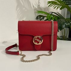 Authentic Gucci Red Leather Interlocking Gg Dollar Crossbody Bag. Double Compartment Small Crossbody Bag With Leather And Chain Strap, Gold Tone Hardware And Gg Closure At Front. In Like New Condition, No Signs Of Wear. Measures Approximately 8” X 6” X 2.75” With A 22” Chain Drop. Fits A Standard Iphone Small Crossbody Bag, Small Crossbody, Chain Strap, Gucci Bag, Red Gold, Red Leather, Crossbody Bag, Bag Lady, Gucci