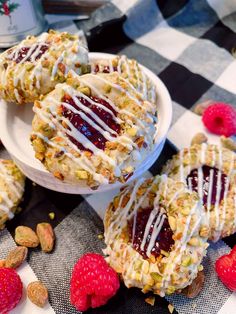 raspberry and almond cookies on a checkered tablecloth