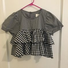 Buffalo Plaid Black And White Ruffle Top. Cropped Size Says 8 But It Is In European Sizes. I Listed It As A Size Small. Purchased In A Boutique In Southern Italy This Past Summer. Cute Black Spring Blouse, Cute Black Blouse With Ruffles, Chic Short Sleeve Plaid Blouse, Trendy Gingham Tops With Ruffles, Chic Gingham Short Sleeve Top, Cute Plaid Ruffled Tops, Plaid Ruffle Tops For Brunch, Plaid Tops With Ruffles For Brunch, Plaid Ruffled Tops For Brunch