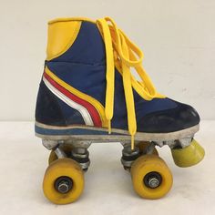 "Vintage '70s children roller skates yellow faux leather, blue suede, red-white-yellow stripes and yellow laces. The toe to heel length outside is app. 22,5 cm (8.86\"). The inner sole measures app. 21.5 cm (8.46 inches) In good vintage condition, with signs of wear, see the pictures. Bearings and wheels are smooth. ----------------------- Thank you for visiting Vintage aan de Linge. If you have any questions, please send us a message. You can find our terms & conditions and how we work at t Retro Yellow Skate Shoes For Sports, Disco Roller Skating, Kids Roller Skates, Retro Rainbow, Yellow Lace, 70s Retro, Roller Skates, Yellow Stripes, Blue Suede