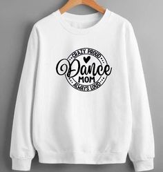 "Crazy Proud Always Loud \"Dance Mom\" Humor shirt for Dance Mom and for your dancer.  Note: White font or text will be printed on darker shirt.  Product Details: *DTF Print or HTV Premium *Actual Graphics/ print are vibrant color *Gildan Softstyle 6400 shirt *4.5 oz., pre-shrunk 100% ringspun cotton *Rolled forward shoulder *Double-needle stitched neckline and sleeves *Quarter-turned *Taped neck and shoulder *Three-quarter inch seamless collar *Tearaway label *cotton/polyester *See photo for WOMEN or UNISEX sizing chart. --Care Instructions--- We love our tees. So, please: Do Inside out before wash, Do warm/cold machine wash Do not bleach, Do not dry clean, Do not iron directly onto the design PROCESSING TIME: We process all orders in just 1 business day and immediately send them to the d Dance Crew Neck Tops With Text Print, Dance Tops With Text Print And Crew Neck, Long Sleeve T-shirt With Letter Print For Dance, Long Sleeve Graphic T-shirt For Dance, Long Sleeve Letter Print T-shirt For Dance, Long Sleeve Graphic Print T-shirt For Dance, White Graphic Print Top For Dance, White Letter Print Top For Dance Class, White Letter Print Top For Dance