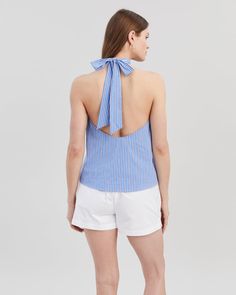 The Barbara Halter Top, made in our cotton poplin fabric, features a high neckline with an open back and ties at the neck. Pair with the Loretto Short. Elegant Cotton Top With Tie Back, Elegant Cotton Tops With Tie Back, Elegant Cotton Tie Back Tops, Chic Cotton Backless Halter Top, Chic Backless Cotton Halter Top, Summer Cotton Tie Back Blouse, Summer Cotton Blouse With Tie Back, Chic Summer Tops With Bow Tie Back, Elegant Cotton Halter Neck Top