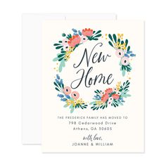 the floral wreath new home card is shown