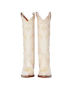 Elevate your cowboy boot collection with Margretta, the pinnacle of Western luxury and the capstone of our collection. Margretta is bursting with signature Miron Crosby jumping stars, including our cluster appliqué on the counter, each one carefully hand-inlayed or hand-appliquéd and reminiscent of the West Texas night skies that inspired our journey. In these boots, tradition meets innovation, and every detail tells a story of hand-craftsmanship and exceptional design. In tonal Crosby crème on Womens Tall Cowboy Boots, Texas Night, Miron Crosby, Western Luxury, Boot Tree, Pretty Heels, Boot Collection, Book Clutch, Fashion Cowboy Boots